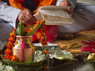 Priest reciting a mantra
