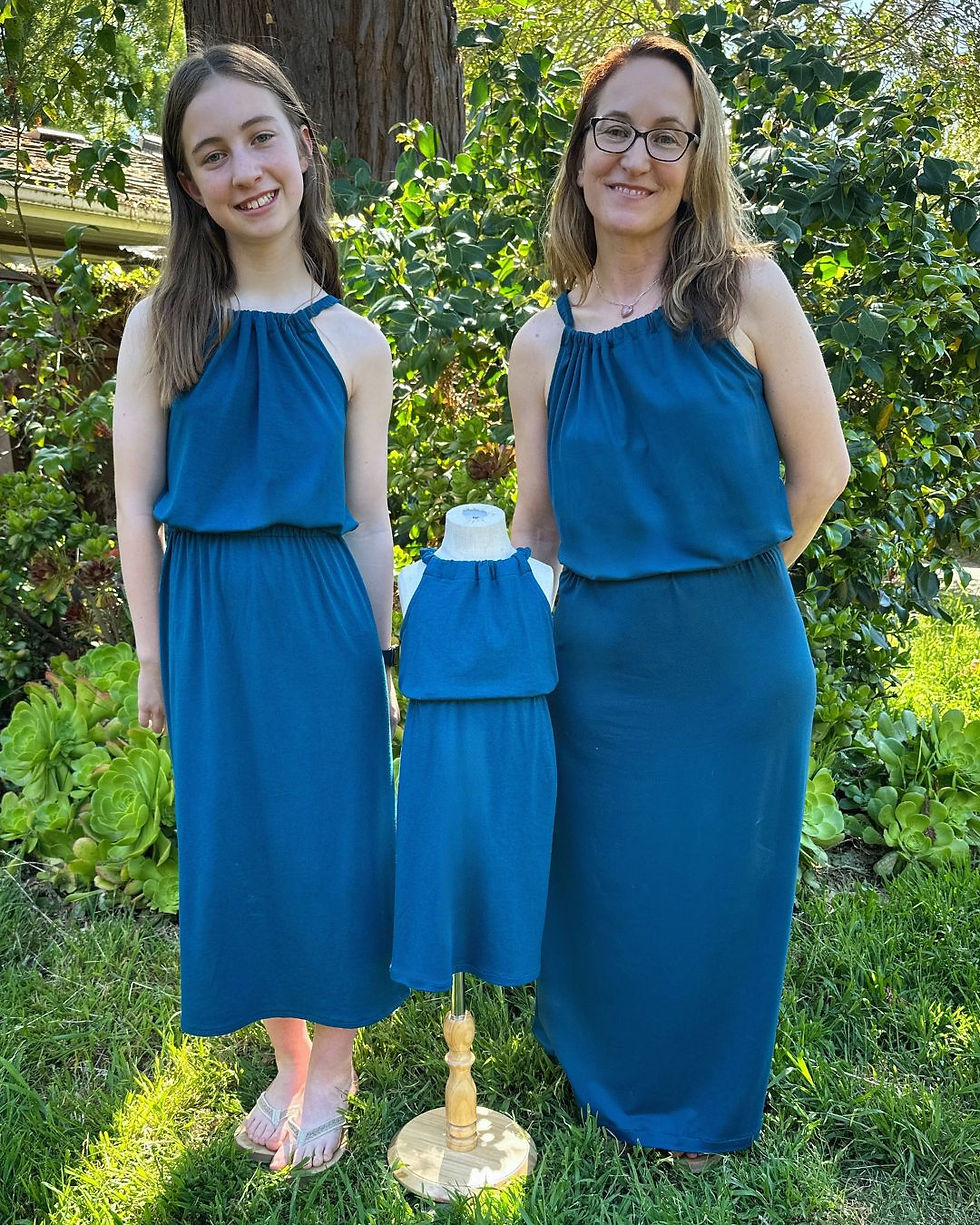 Thumbnail: Woman and teen wearing Uno Dresses in blue teal fabrics