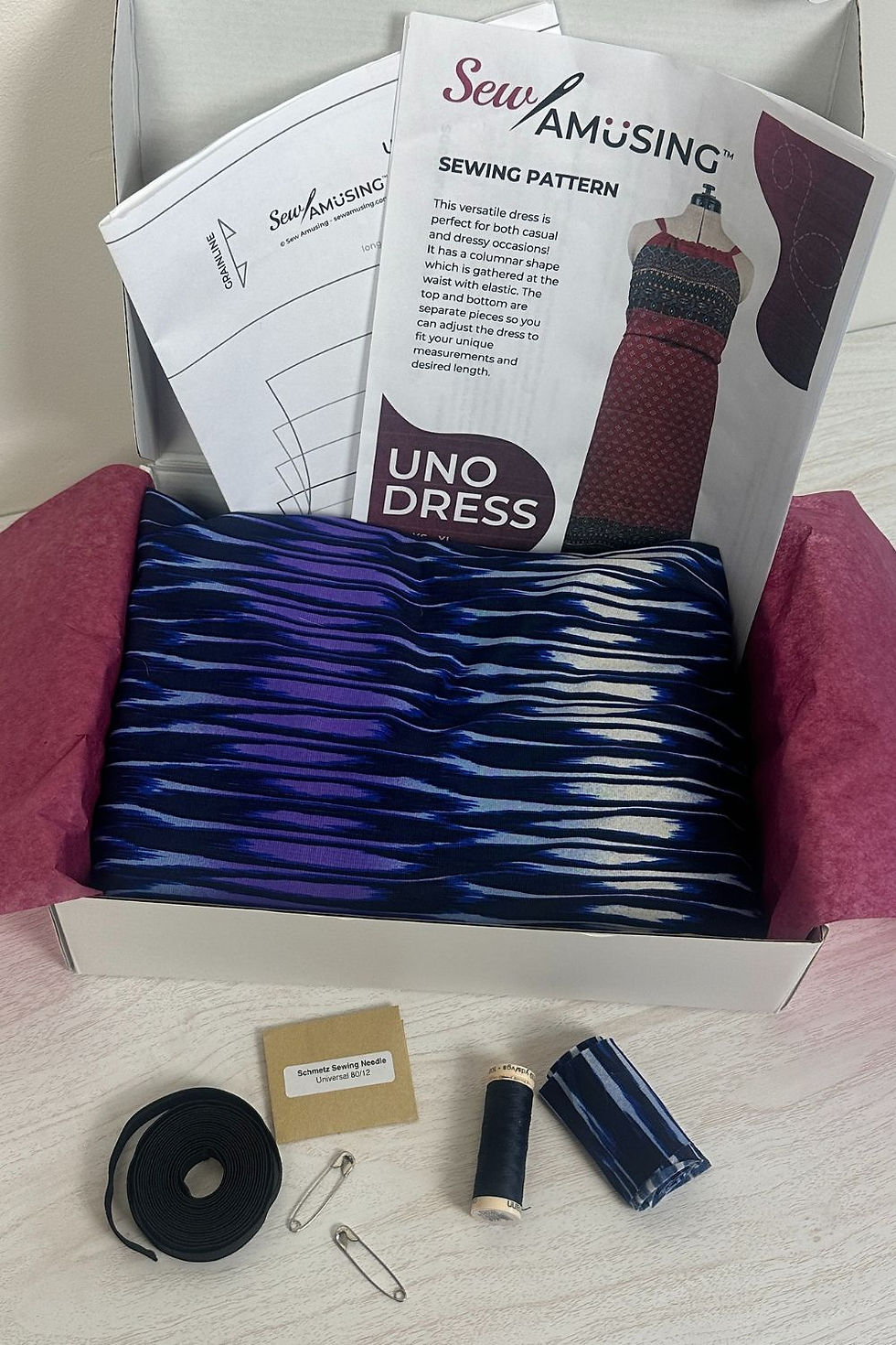 Thumbnail: Uno Dress Sewing Project kit in package with blue-purple fabric