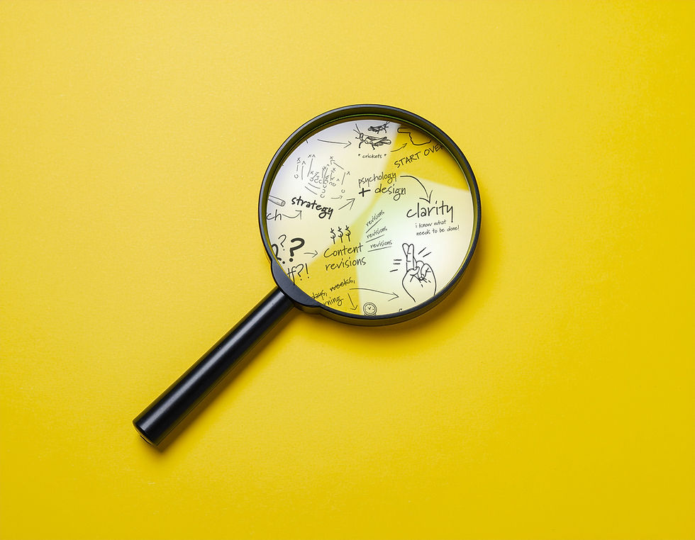 Photo of a magnifying glass on a yellow background