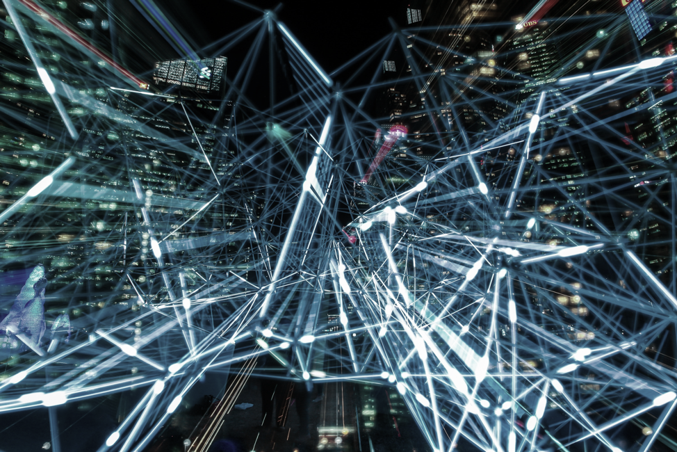 data web in front of a city skyline