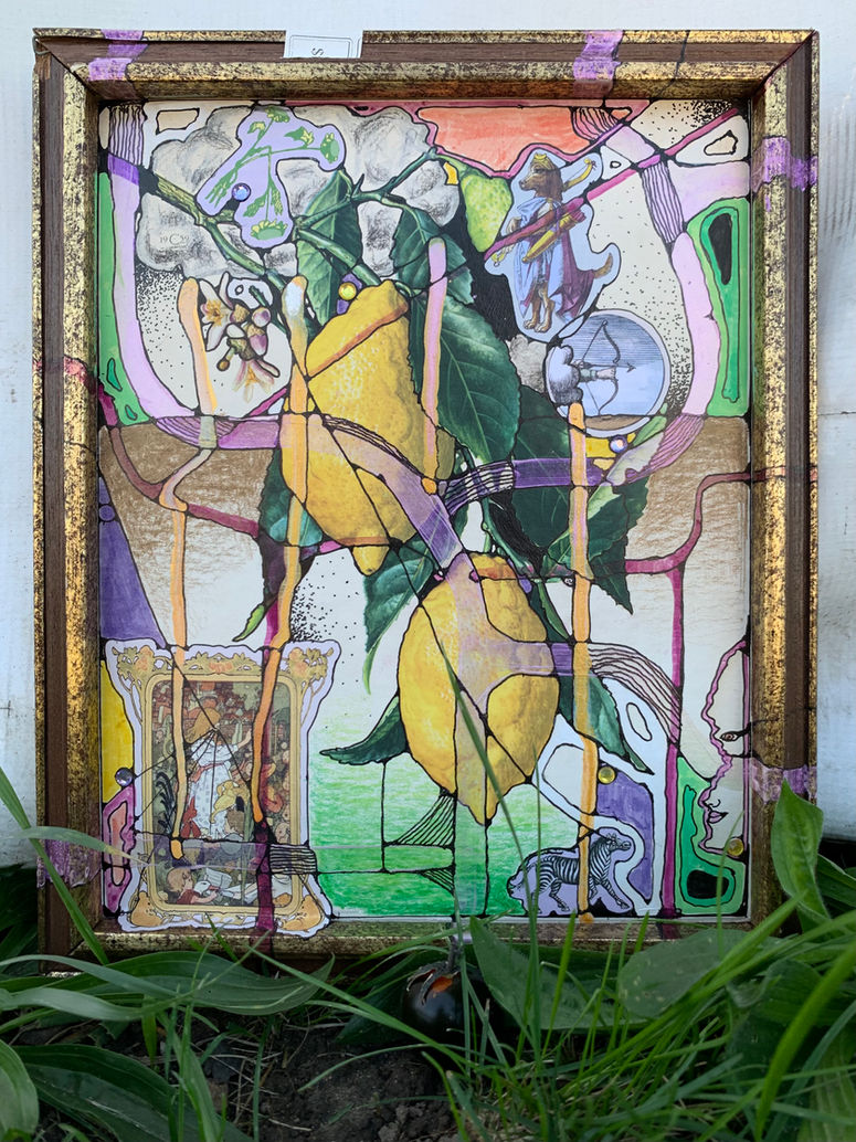 Mixed media art materials used on a vintage print and placed in grass environment.