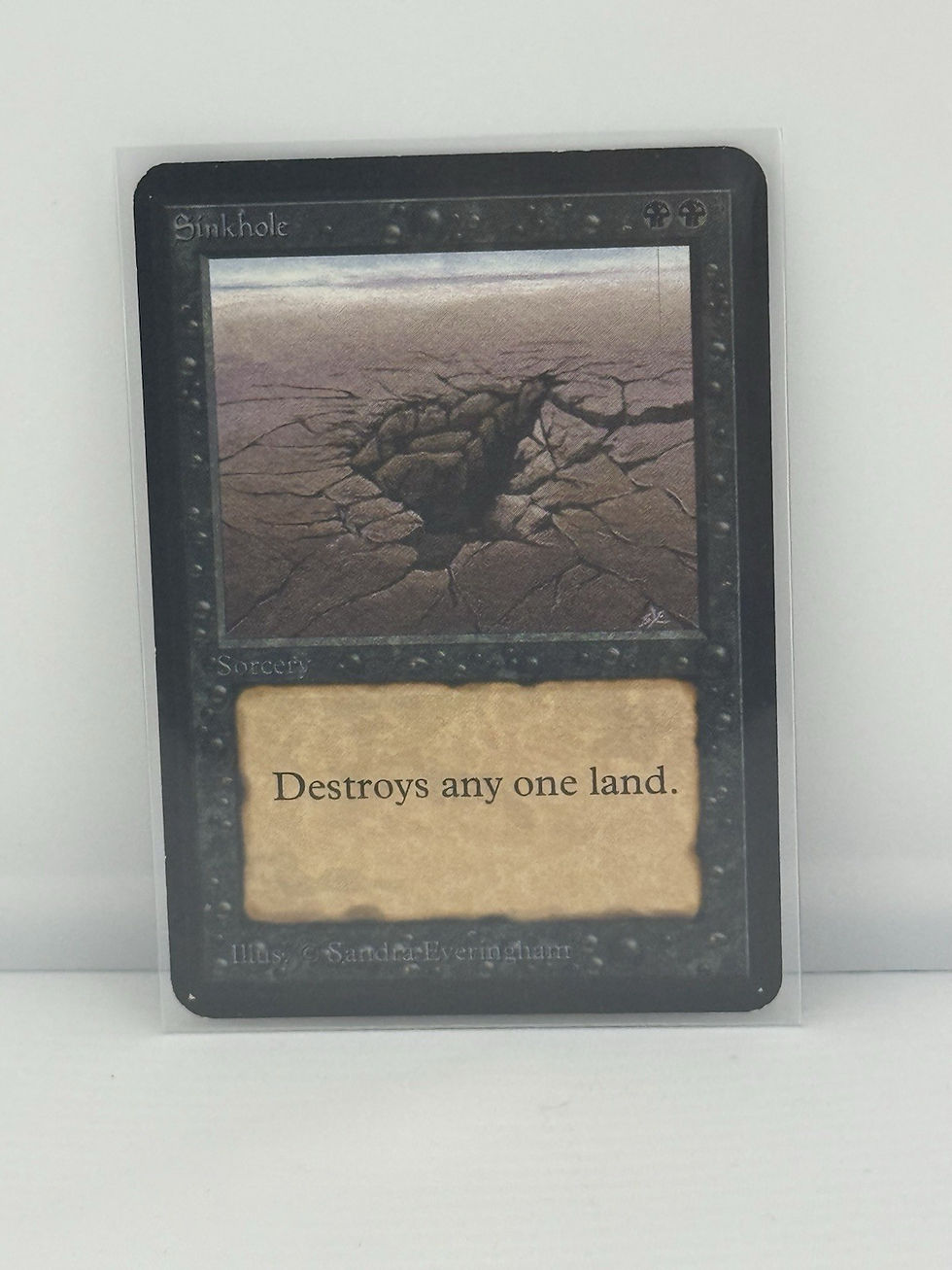 Thumbnail: Sinkhole Alpha NM Black Common MAGIC THE GATHERING CARD (ID# 469657) ABUGames