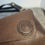 Thumbnail: front logo detail of roxy bag in brown