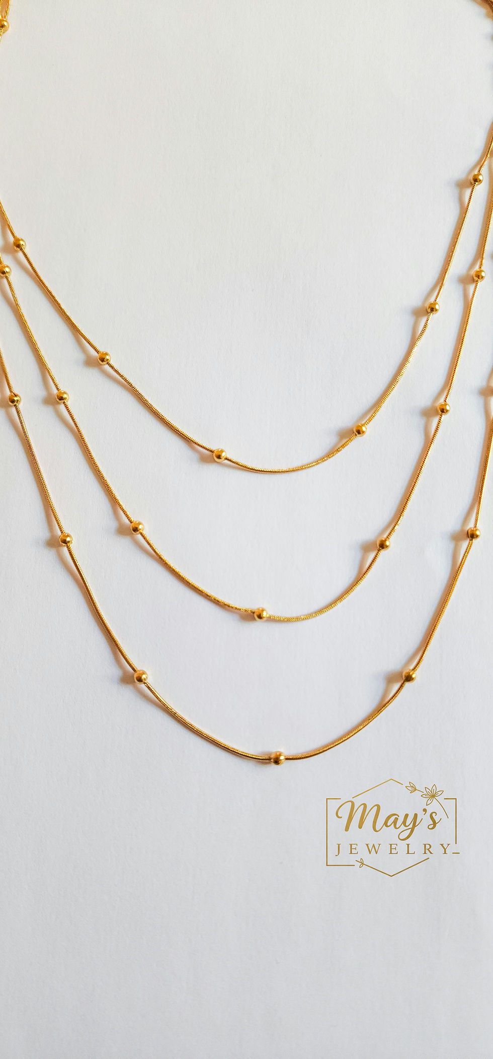 Collier Multi-chaines Gouttes Dorées