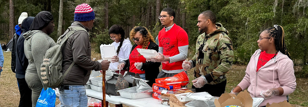 Volunteers distributing supplies outdoors