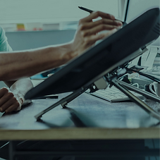 Designer drawing on a digital pen tablet