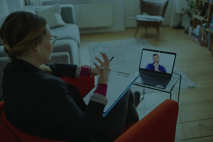 Woman speaking to client on a video call