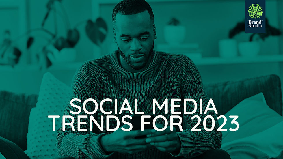 Man on his phone in a green themed image that is consistent with the brand studio brand image