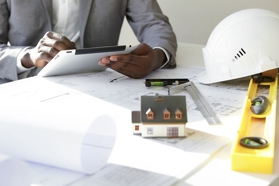 cropped-shot-dark-skinned-contractor-holding-touch-pad-entering-data-while-working-new-hou
