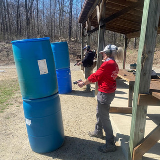 Students learning how to shoot from simulated cover/concealment during NRA Personal Protection Insid