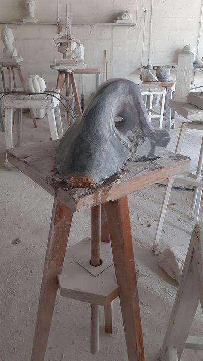 "Collapsed fin“ in progress, there is a tiny whole where the fin is still connected to the body of the sculpture. The surface is dark gray now.