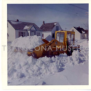 Tractor moving snow / TH98.17.15.3