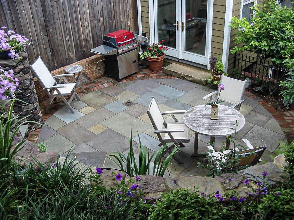 Circular bluestone patio in a DC garden viewed from above.