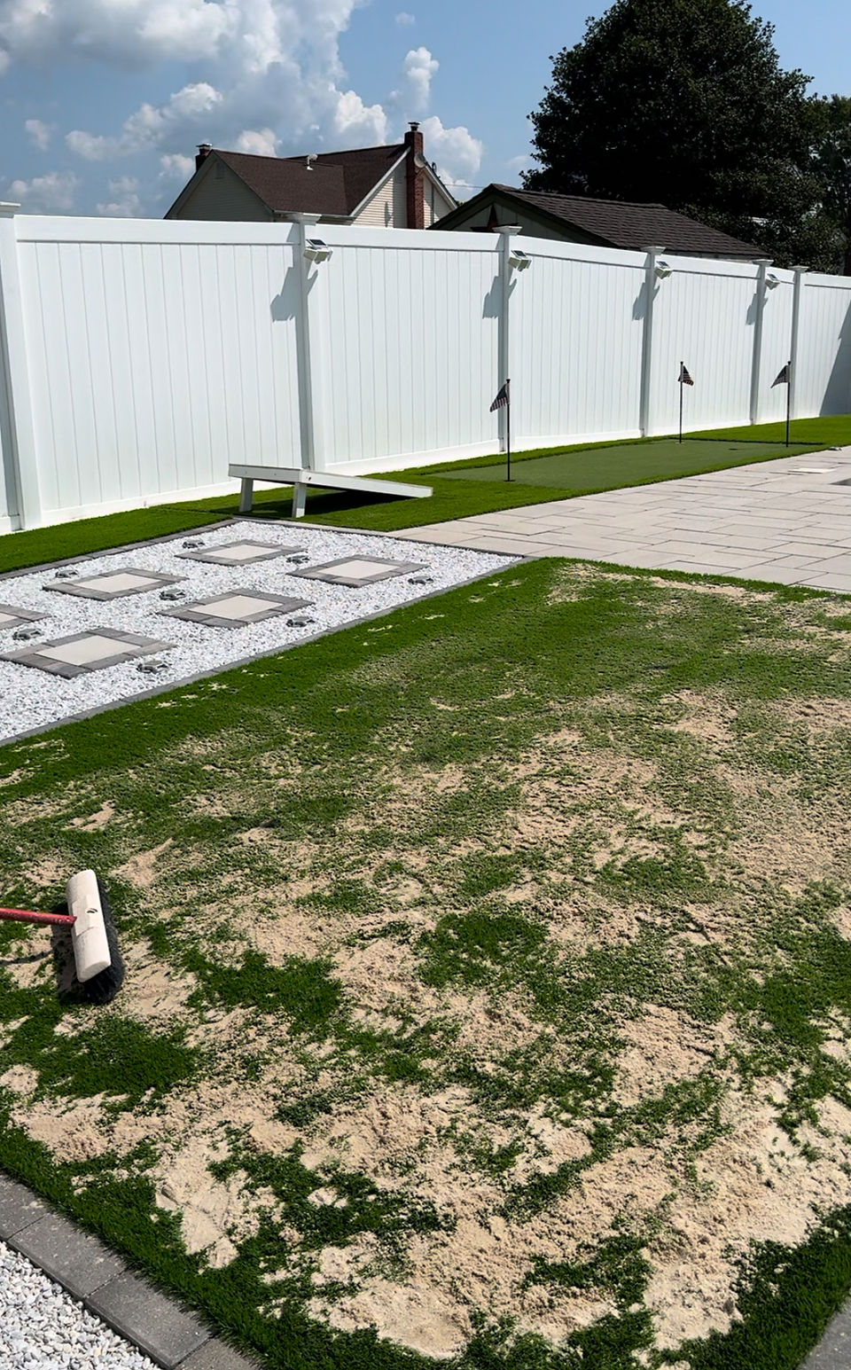 Adding infill to artificial turf.