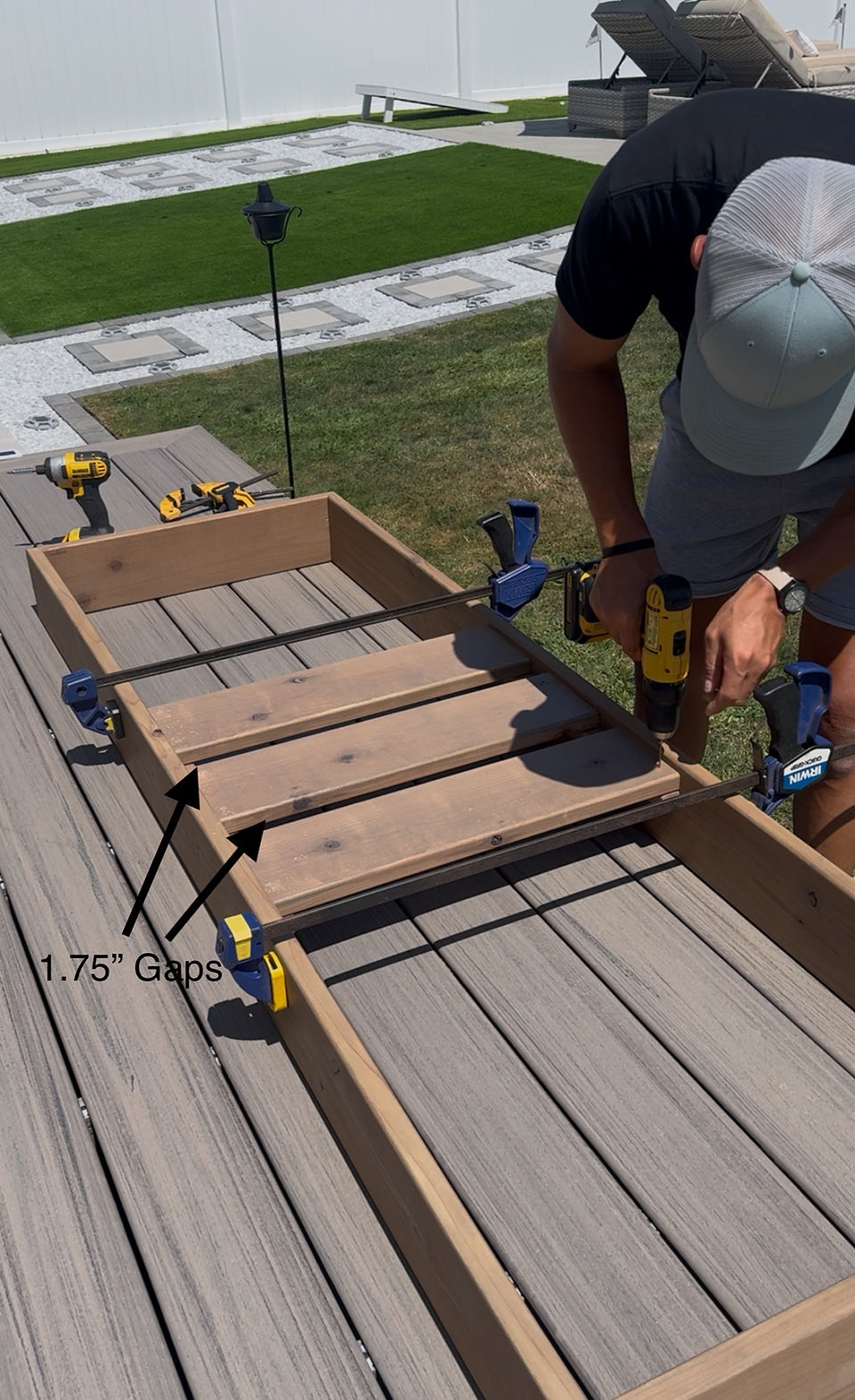 Screwing down lounger bench.