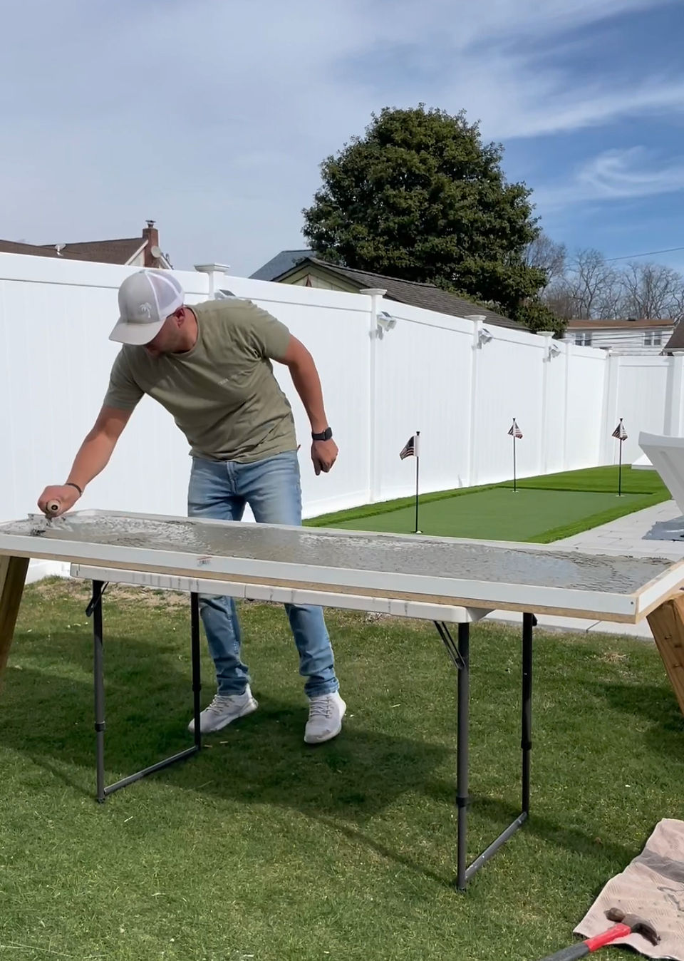 Pressing concrete into corners of the form.