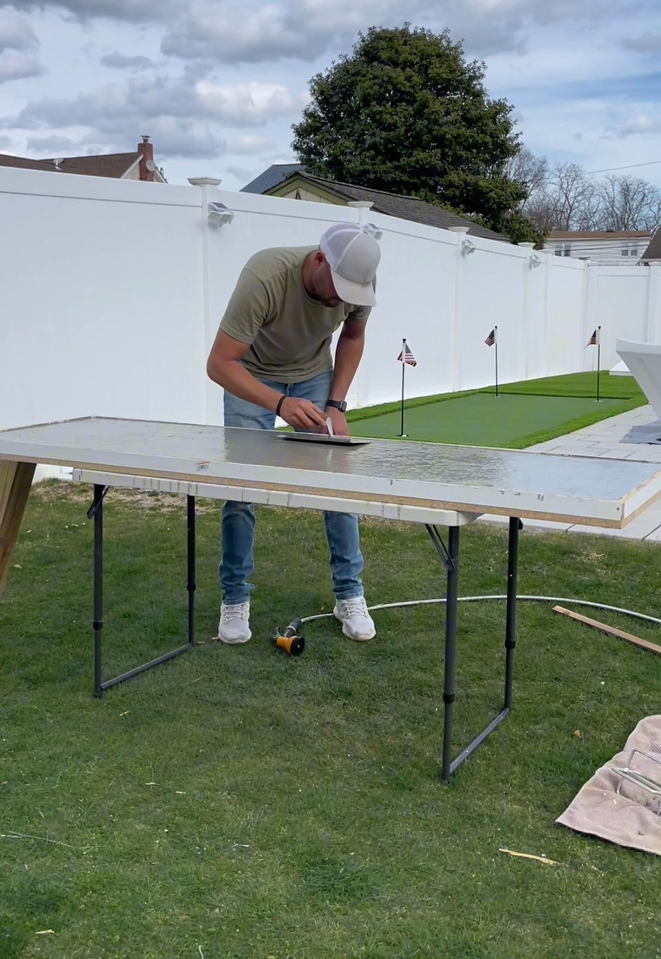 Smoothing out concrete.