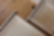 Geöffnete Schubladen aus 3 Schichtplatte mit kleinem schwarzen Knauf.