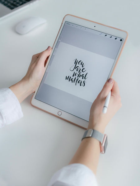 person using tablet computer