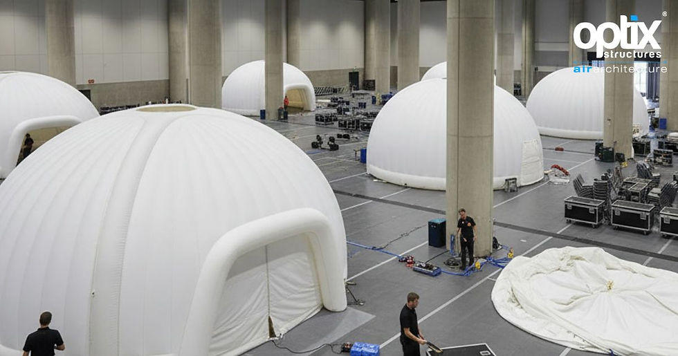 Optix Panoramic and Pyramic meeting spaces being installed inside a large corporate conference hall.