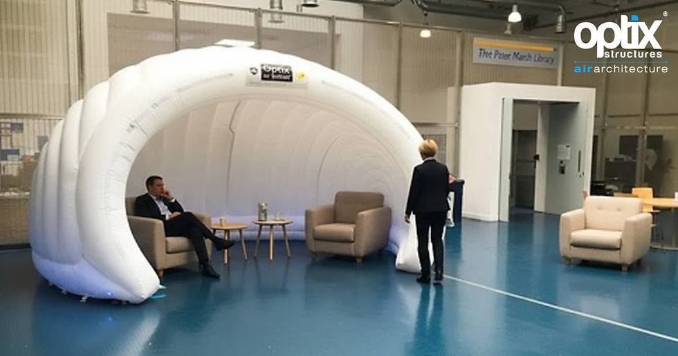Interior of a white Optix inflatable calm space with soft seating and accessible circulation