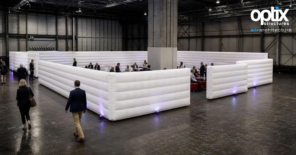 Optix Inflatable Walls creating flexible exhibition zones around a venue column.