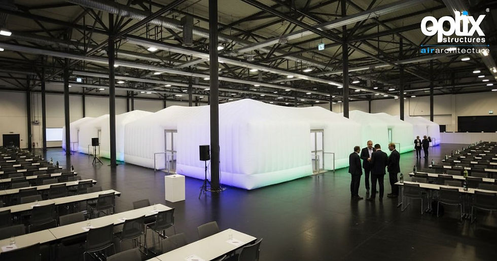 Optix 12m Pyramic meeting structure inside a large corporate event hall.
