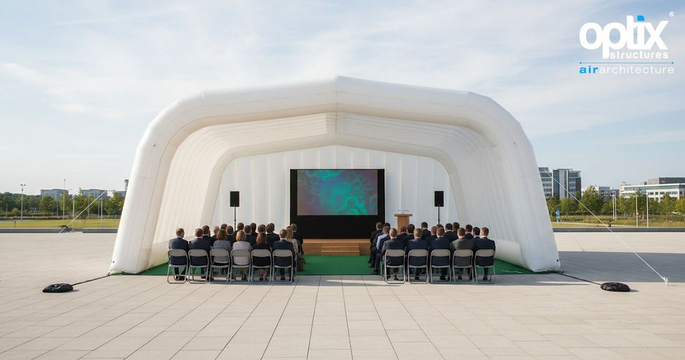 A 12 by 6 metre Optix Air Roof covering an open corporate presentation and audience area.