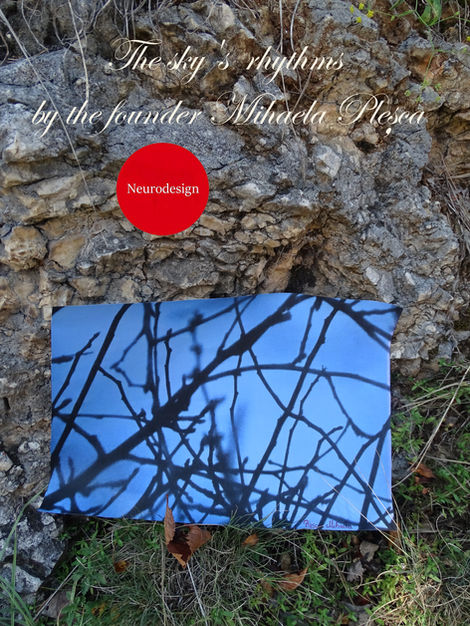 On the mountain, a blue and black photograph is put it. The photograph by the founder Mihaela Plesca.