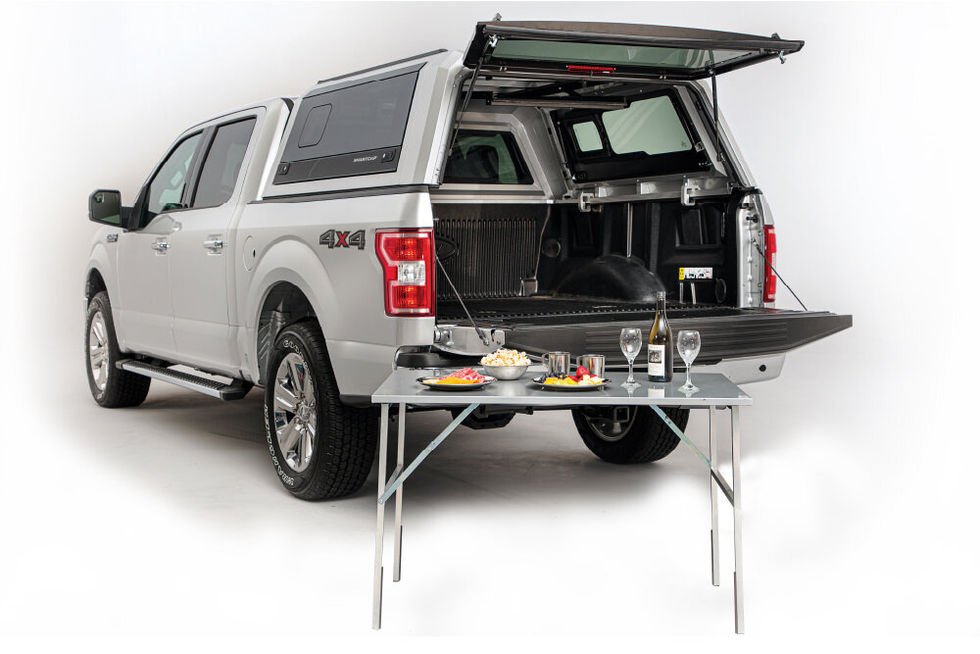The StowAway is a pop-up picnic table that stores conveniently in the interior roof of your SmartCap.