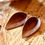 Thumbnail: Medium Folded Leaf Weathered Brown Leather Earrings