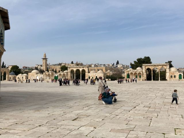 The large square at the Temple Mount hosts families at picnic and play