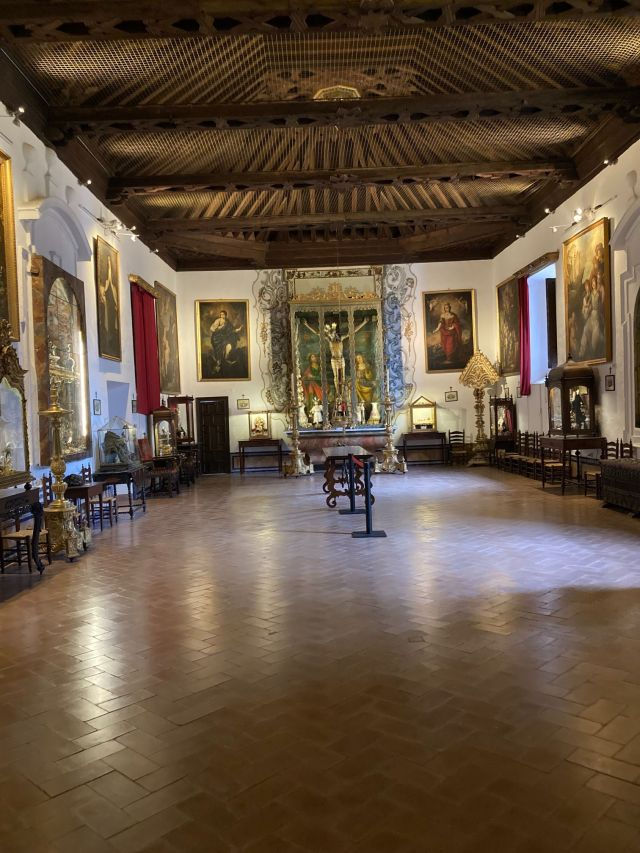 large room with a lot of art