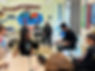 Group of students in classroom with teacher