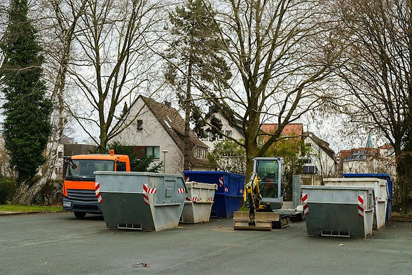 containers-construction-waste-construction-equipment-parking-lot_389554-551.jpg