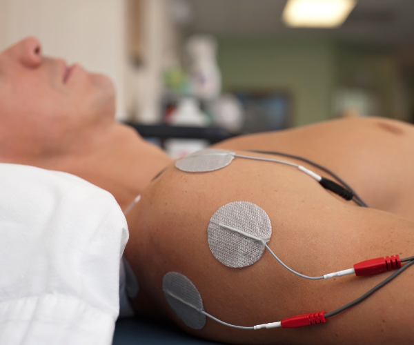 NMES passes safe electrical impulses through the affected area, stimulating and contracting the muscles and helping them work again.