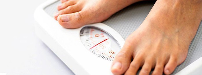 any sudden weight loss, along with low back pain should be evaluated by your healthcare professional.