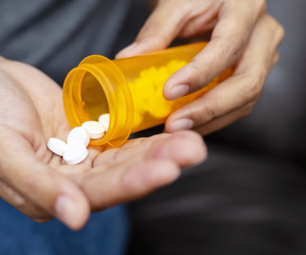 Taking painkillers is still a common treatment for low back pain.