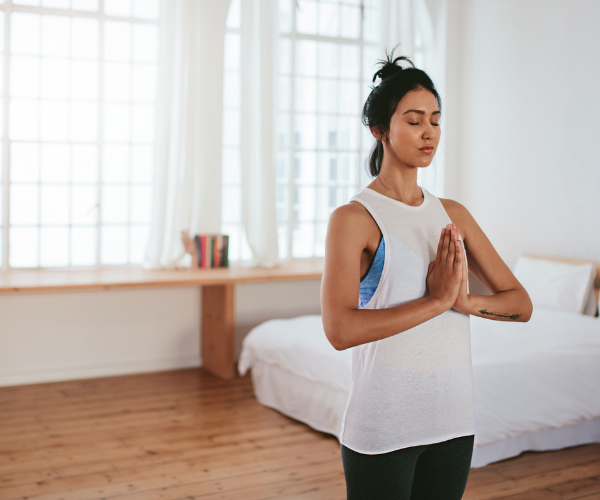 Lady practicing meditation to help with scoliosis