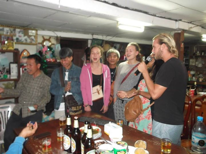 attempting to sing Hotel California with some local Lao men.jpg.jpg.jpg