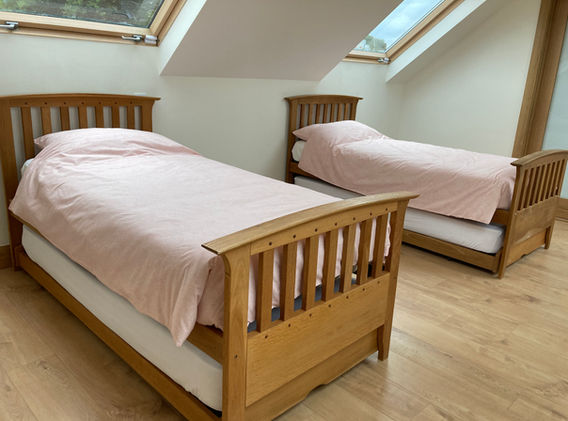 Single beds, can be made up to 4 single beds with 2 single beds underneath with change int