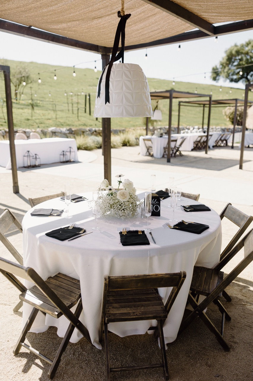a table set for a wedding reception with a table number 10 on it