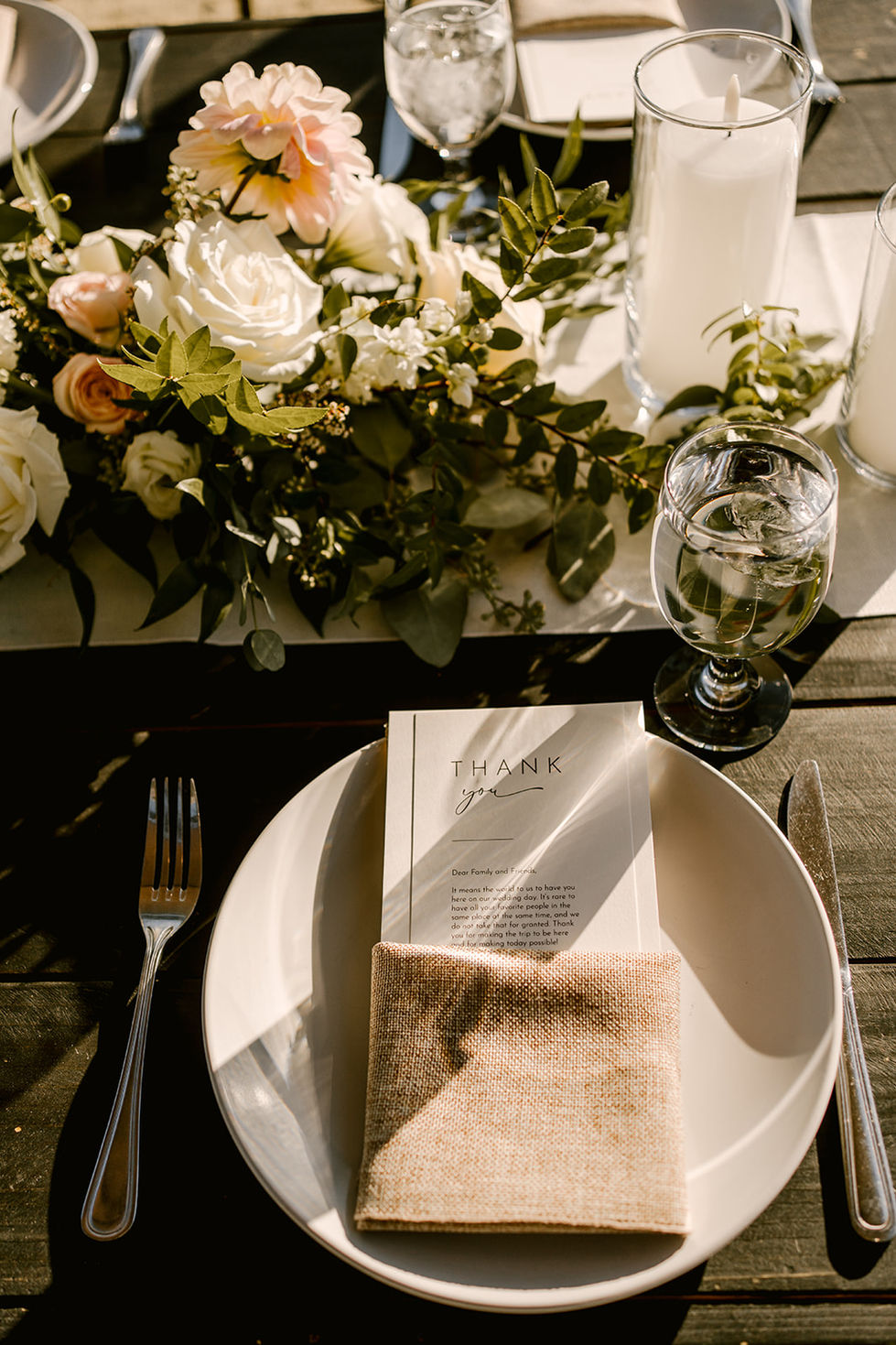 a white plate with a thank you card on it