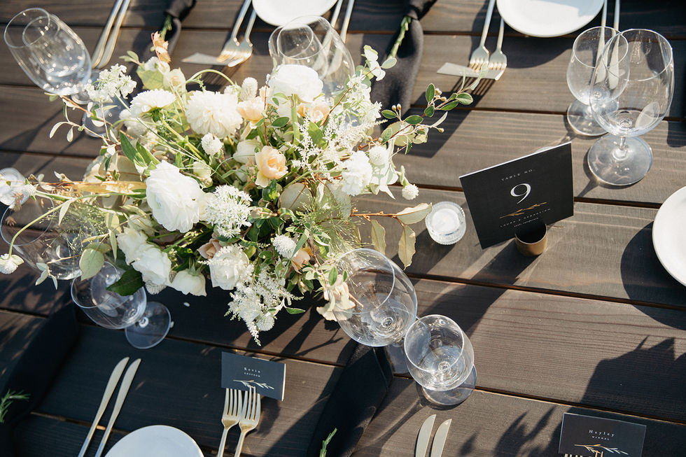 a table with flowers and a table number 9