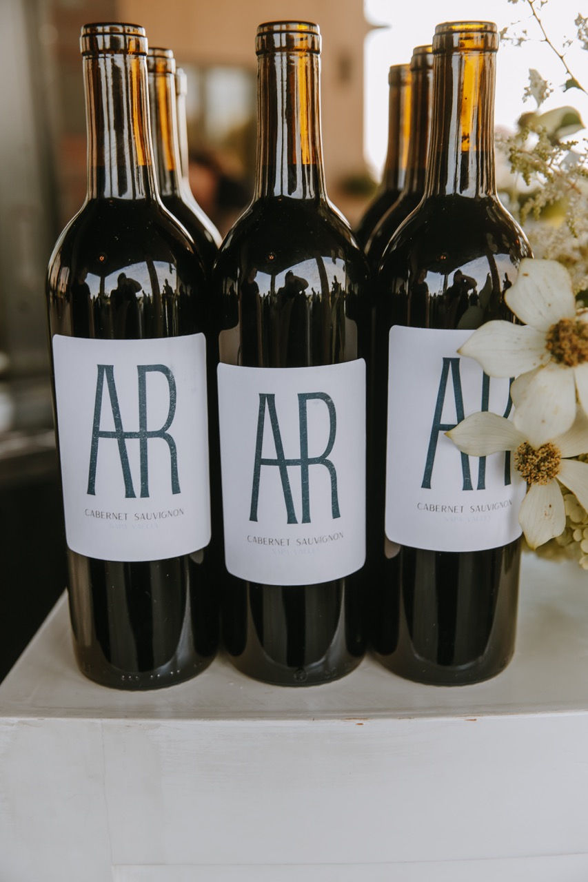 custom labels for wine bottle at wedding bar