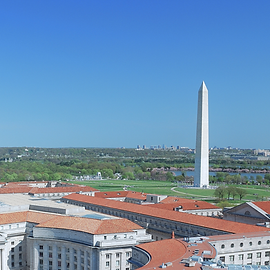 Picture of Washington, D.C. rooftops with Washington Monument in the back.