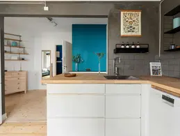 Open concept kitchen and living room ideas 2026  seamless Scandinavian layout with wood floors