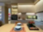 Authentic Japanese minimal kitchen with warm under-cabinet lighting, chopsticks, and natural wood surfaces Japandi 2026