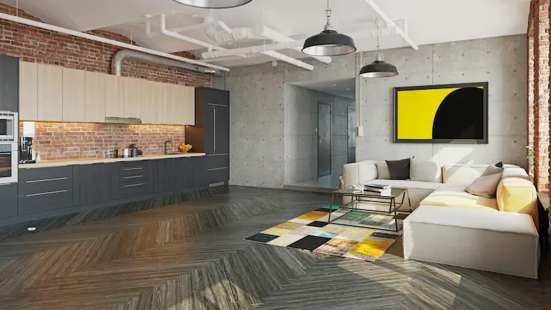 Rustic industrial kitchen with exposed brick backsplash, dark flat-front lower cabinets, and light wood uppers - 2026